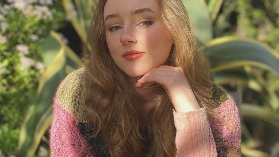 Sadie Fearon headshot in front of plants