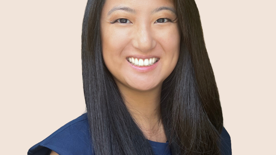 headshot of Nicole Go, an Asian woman, wearing a blue blouse