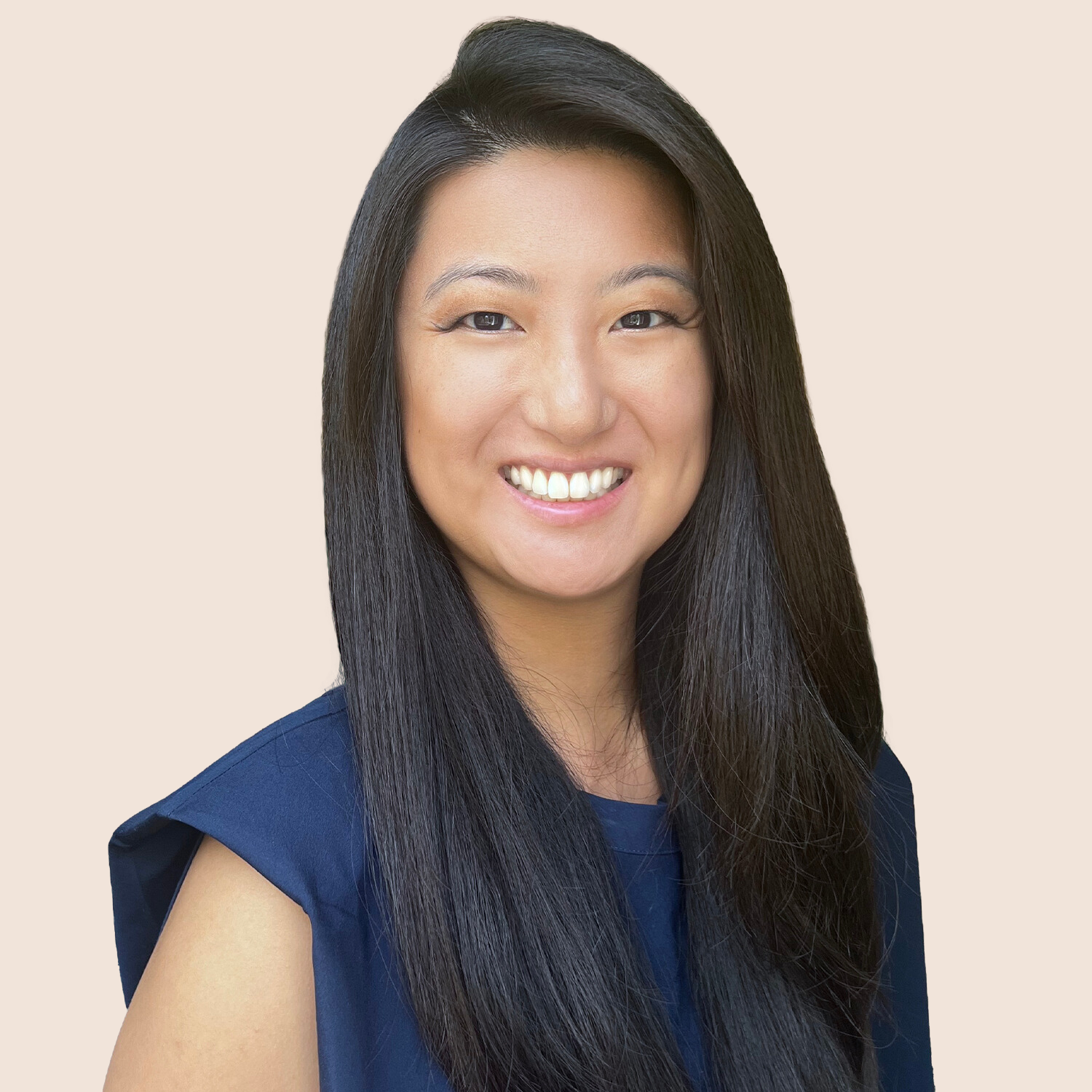 headshot of Nicole Go, an Asian woman, wearing a blue blouse