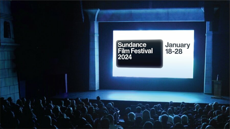 Sundance Film Festival 2024 logo on the screen in a packed movie theater. Text reads January 18-28