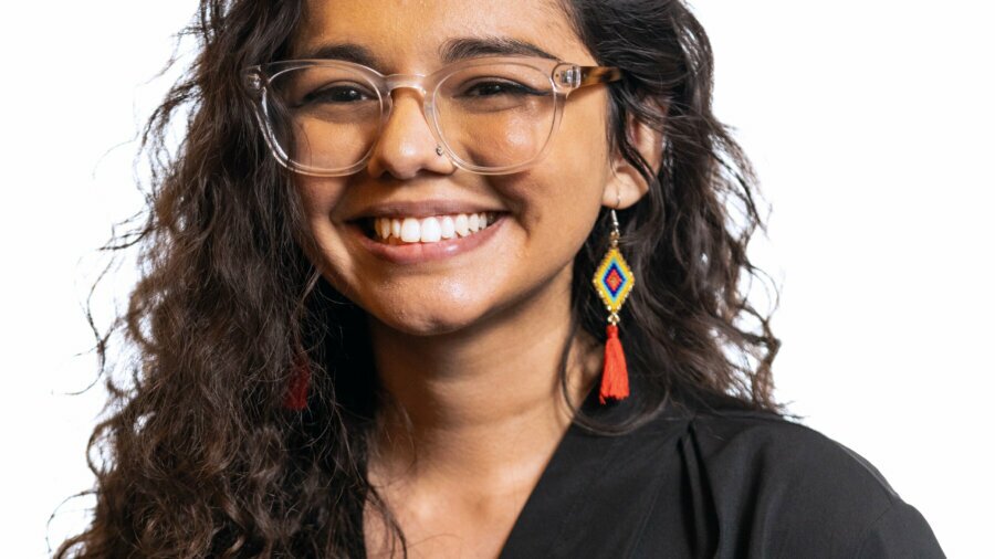 Isabella Vargas smiling headshot wearing a black shirt