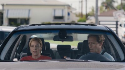 still from Sundance Film Bulldozer showing two people in a car