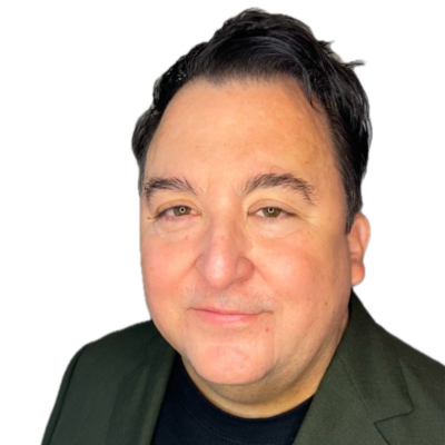 Darren Bates smiling headshot wearing a grey blazer