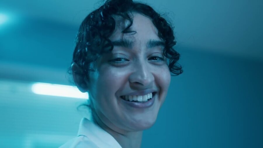 thumbnail for The Invalids with a person smiling in a laboratory environment