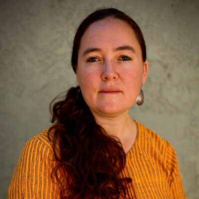 headshot of Mae Thornton Mehra