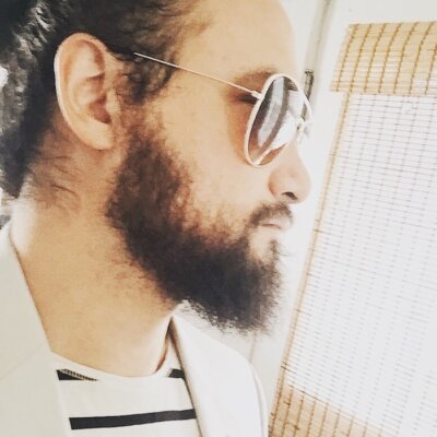 Stephen Nolly headshot wearing sunglasses