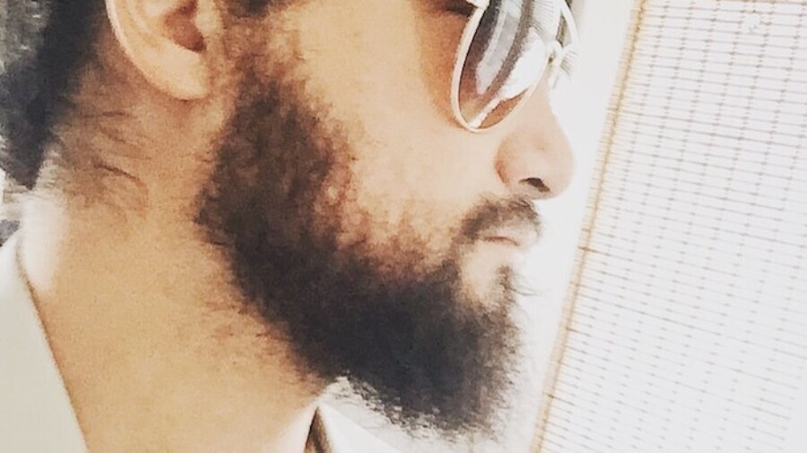 Stephen Nolly headshot wearing sunglasses