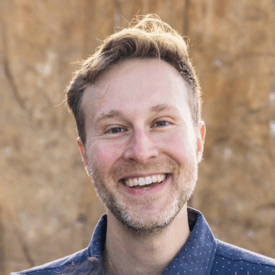 Christopher James smiling headshot