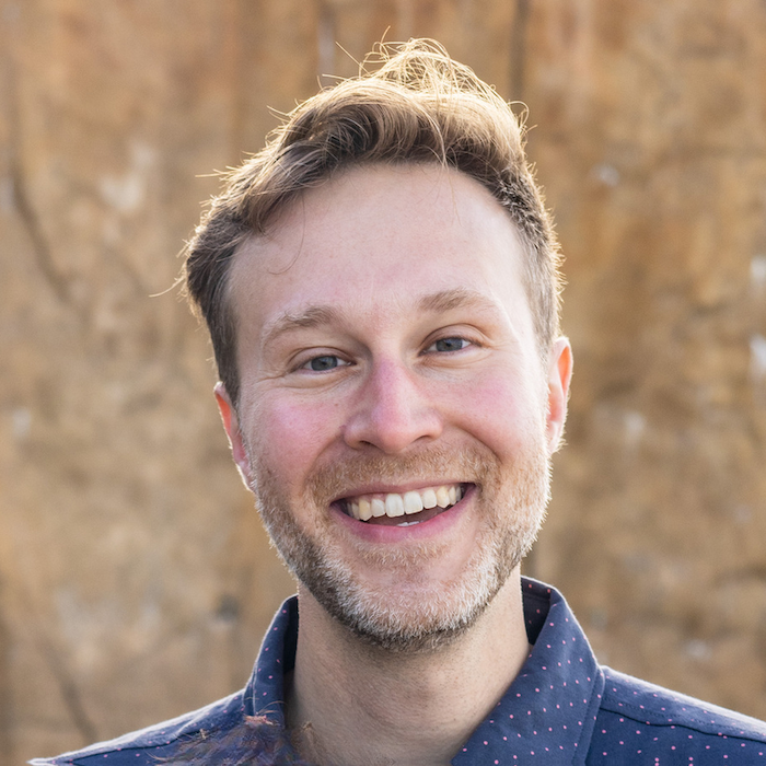 Christopher James smiling headshot